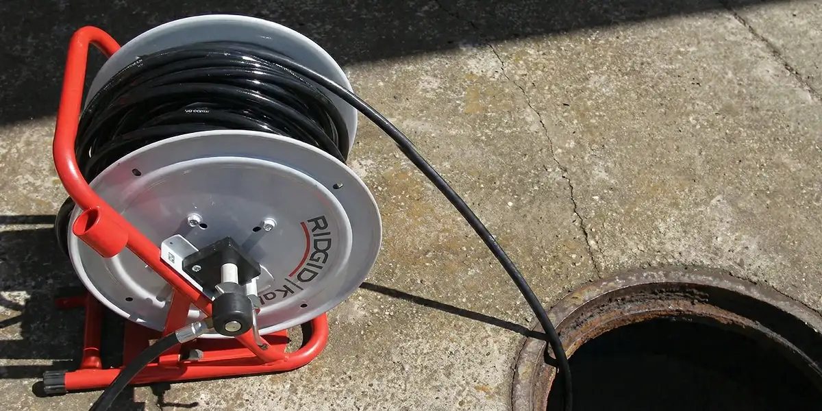 sewer rodding equipment prepared to clear clogged sewer lines in Oklahoma City, OK