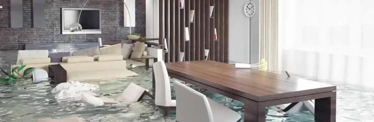 home interior affected by water damage with flooded floors and displaced furniture in Oklahoma City, OK